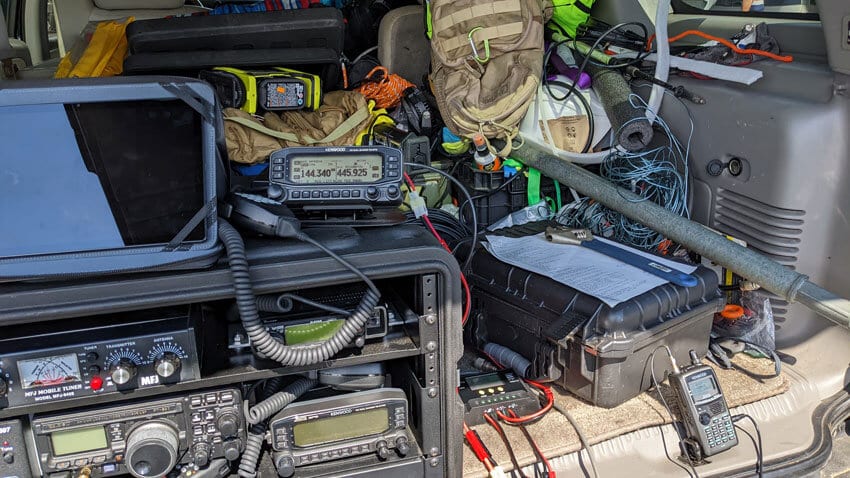 NT1I’s gear used for the 2022 APRS golden packet event.  The group uses a unique 2 Meter frequency (144.340) for the packets and a UHF channel for voice coordination.  Photo by Jim Reed - N4BFR.
