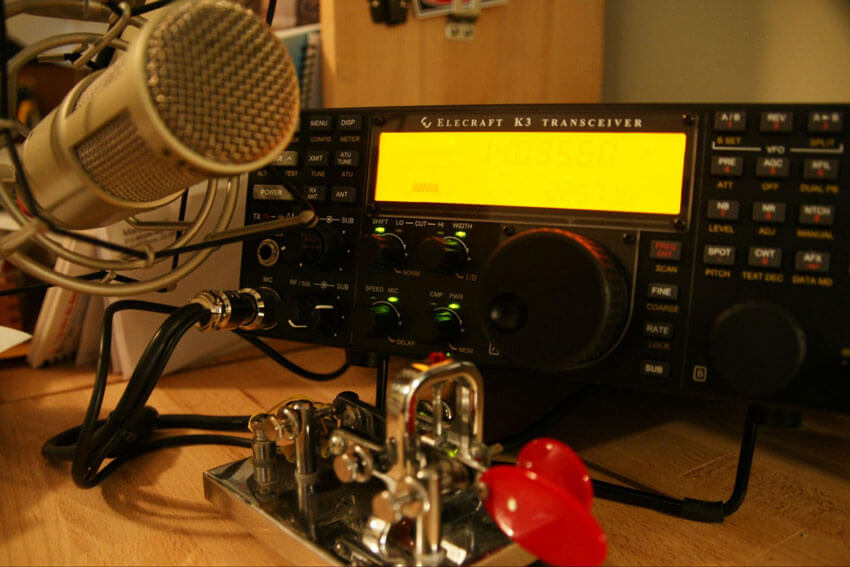 One of the most rewarding aspects of ham radio is building and operating your own radio station. While it may seem intimidating at first, it's actually quite simple to get started. Image: This ham radio station includes a transceiver with upgraded mic and a Morse code key.
