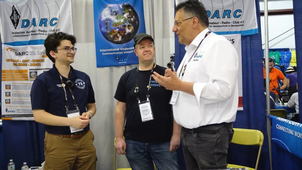 Hanno and Stefan from DARC talking with Max from Ham Radio Prep
